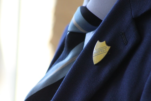 Describe a uniform you wear at your School or Company IELTS Cue Card